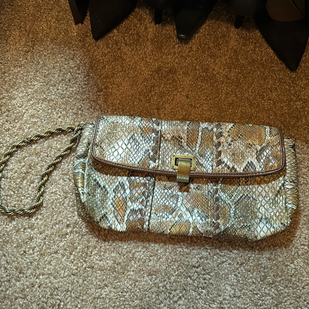 Faux snake skin clutch